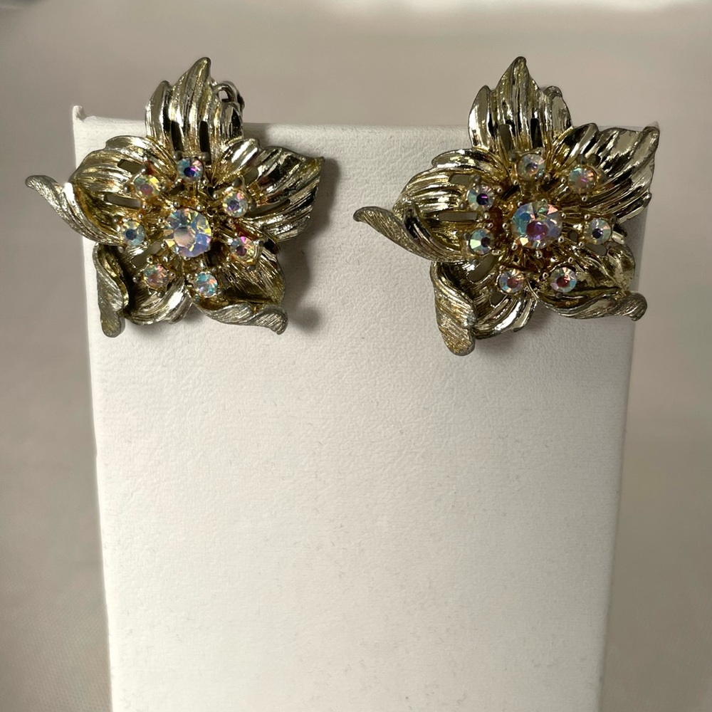 Signed Ciro mid century 1950’s “flower” ear clips Aurora Borealis crystals.
